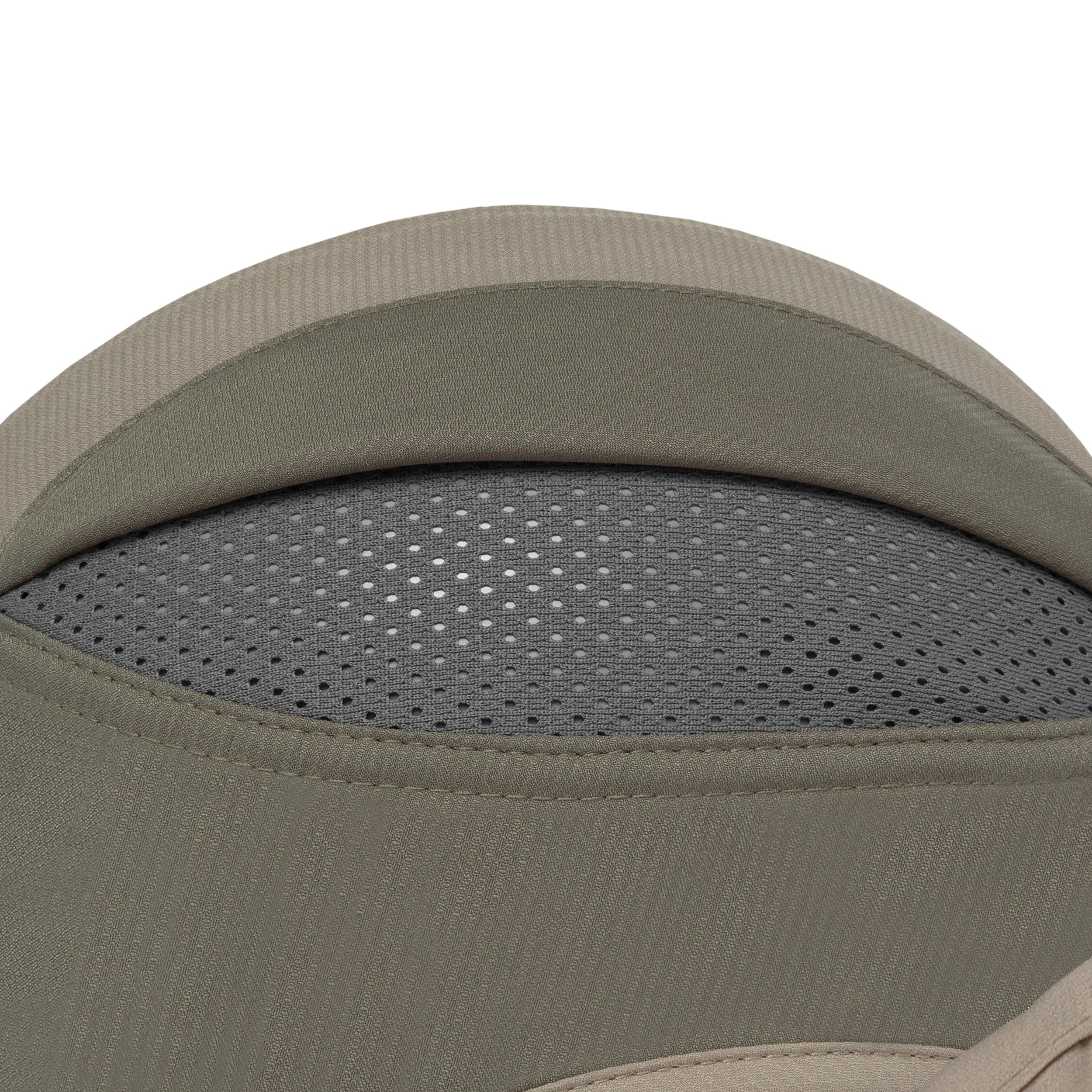 Close-up detail of a product showing a curved olive green fabric surface with a gray perforated mesh section and a beige stitched trim against a white background.